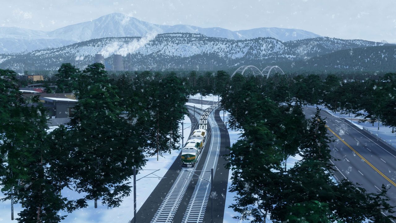 A train crossing a snowy valley