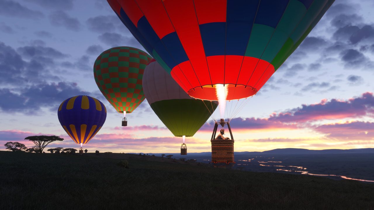 Hot-air balloons rising at dusk