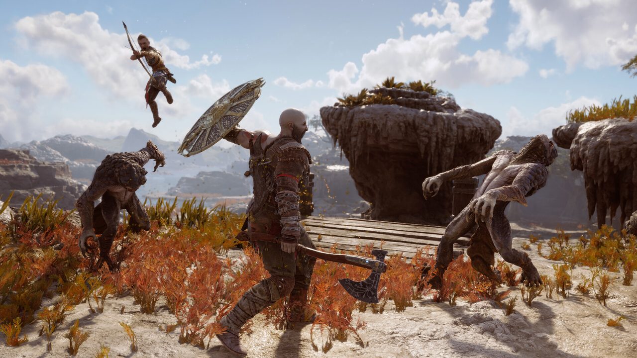 Kratos fighting beasts on a snowy plain