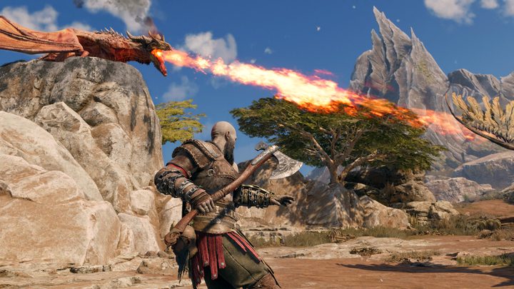 Kratos facing a fire-breathing dragon