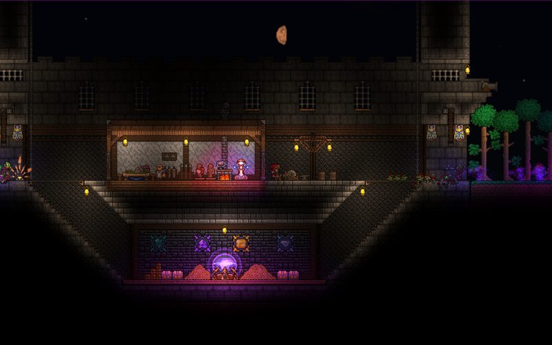 An underground base glowing beneath a moonlit sky