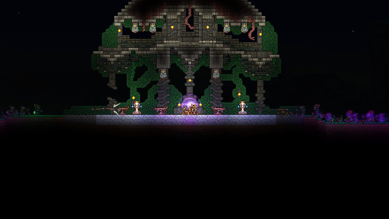 A jungle temple lit by torches at night
