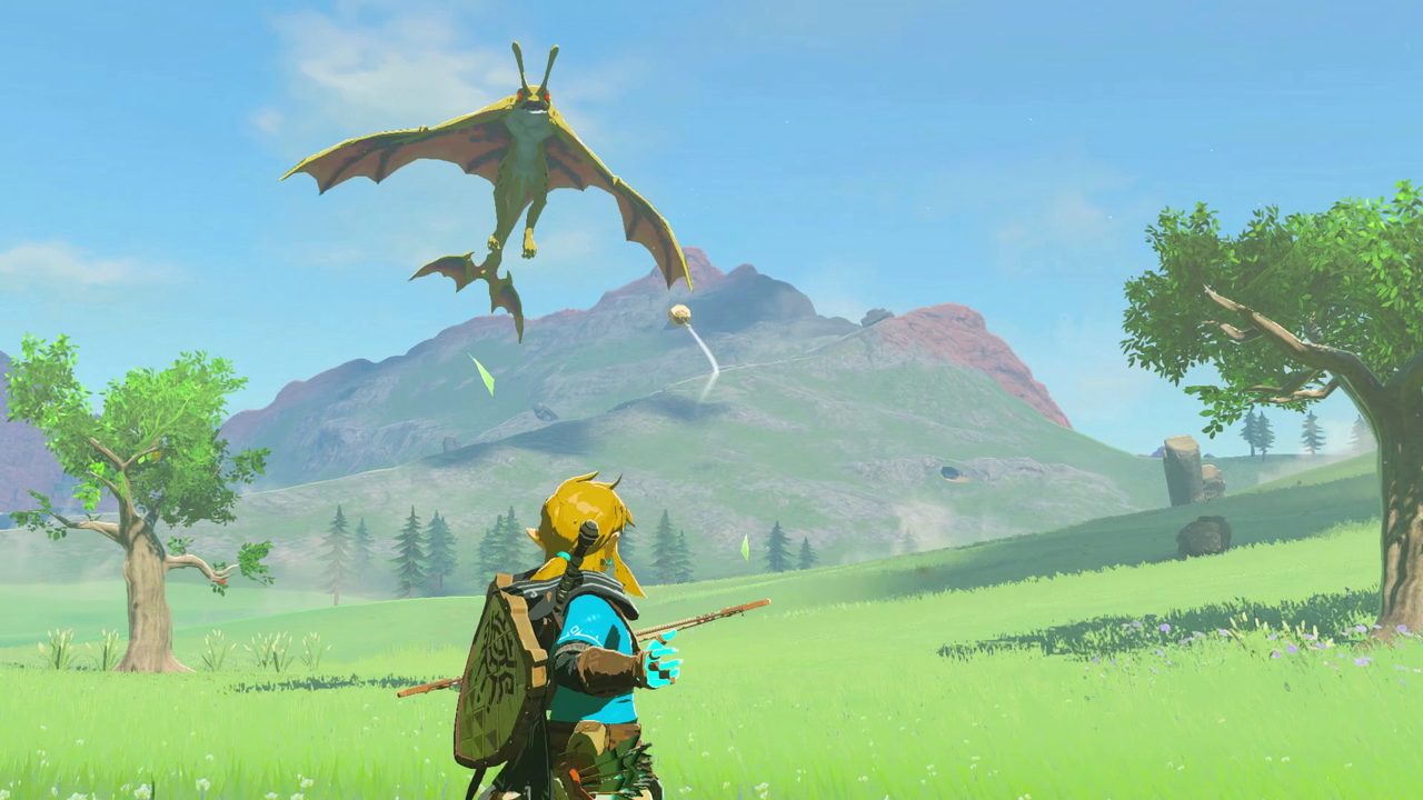 Link drawing a bow as a winged creature circles over Hyrule Field